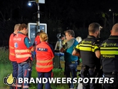 Persoon te water aan de Dr. Deelenlaan in Tilburg (+Video)