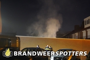 Brand bijgebouw Nassaulaan in Rijen